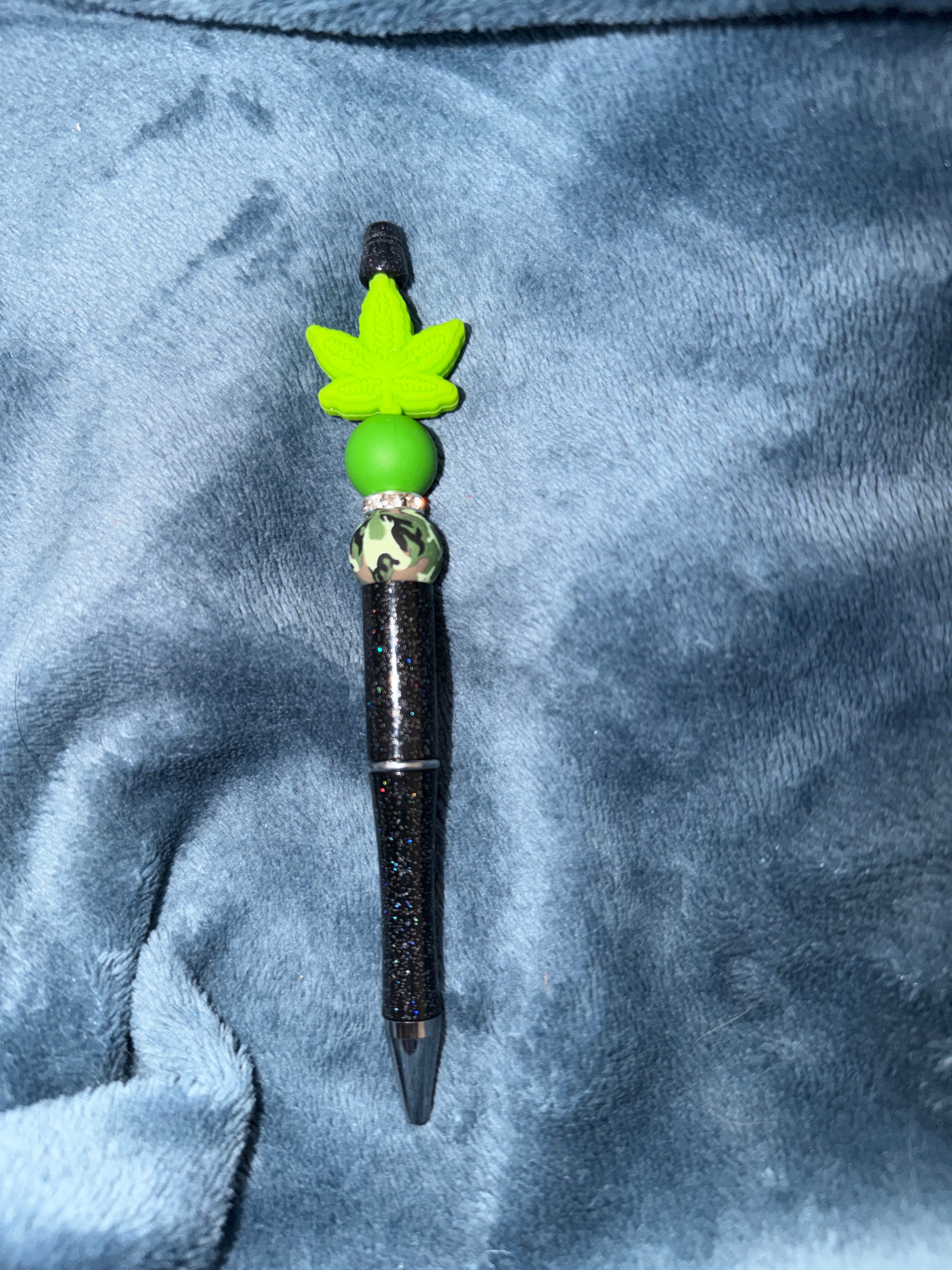 Shinny black and camo pen